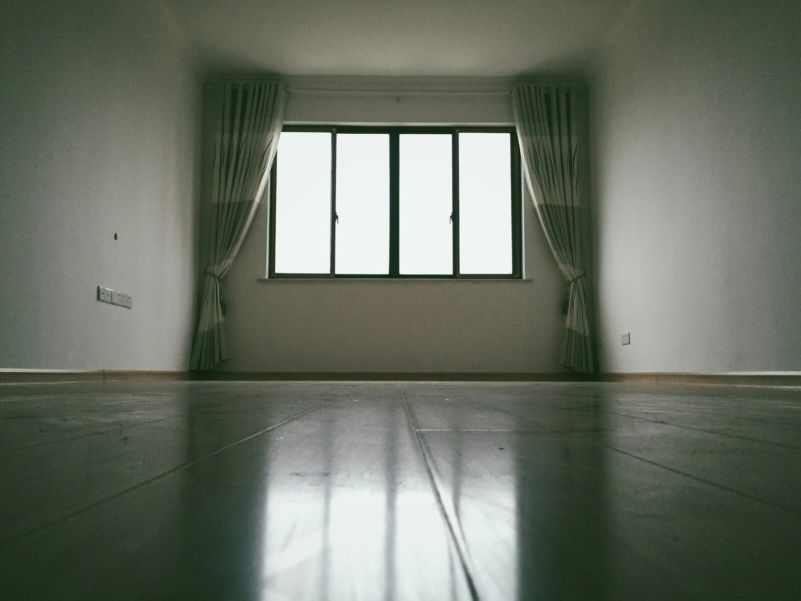 A bright, empty apartment cleaned ready for handover